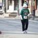 A participant walks in the final leg of the Shamrocks and Shenanigans 5K on Main Street on Sunday, March 10. Daniel Brenner I AnnArbor.com